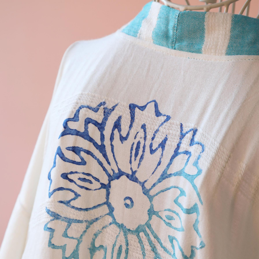 Hand-made floral design at the back of a kimono by wood block printing method