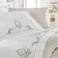 Beige duvet cover ornamented with brown and silver color, damask patterns pairs with shams