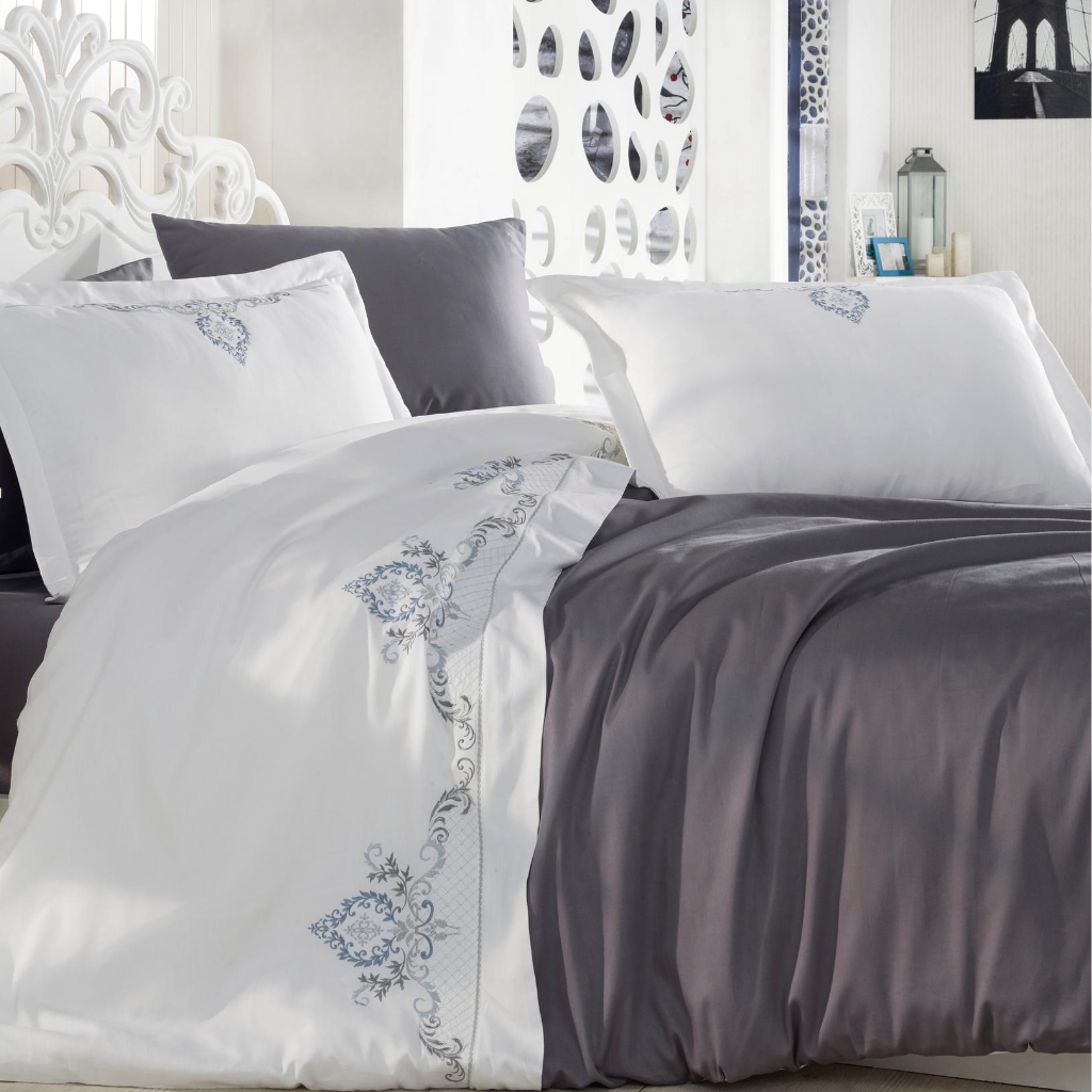 White bedroom decorated with duvet cover in anthracite and white color that pairs with anthracite bed sheet and 2 pillowcases.