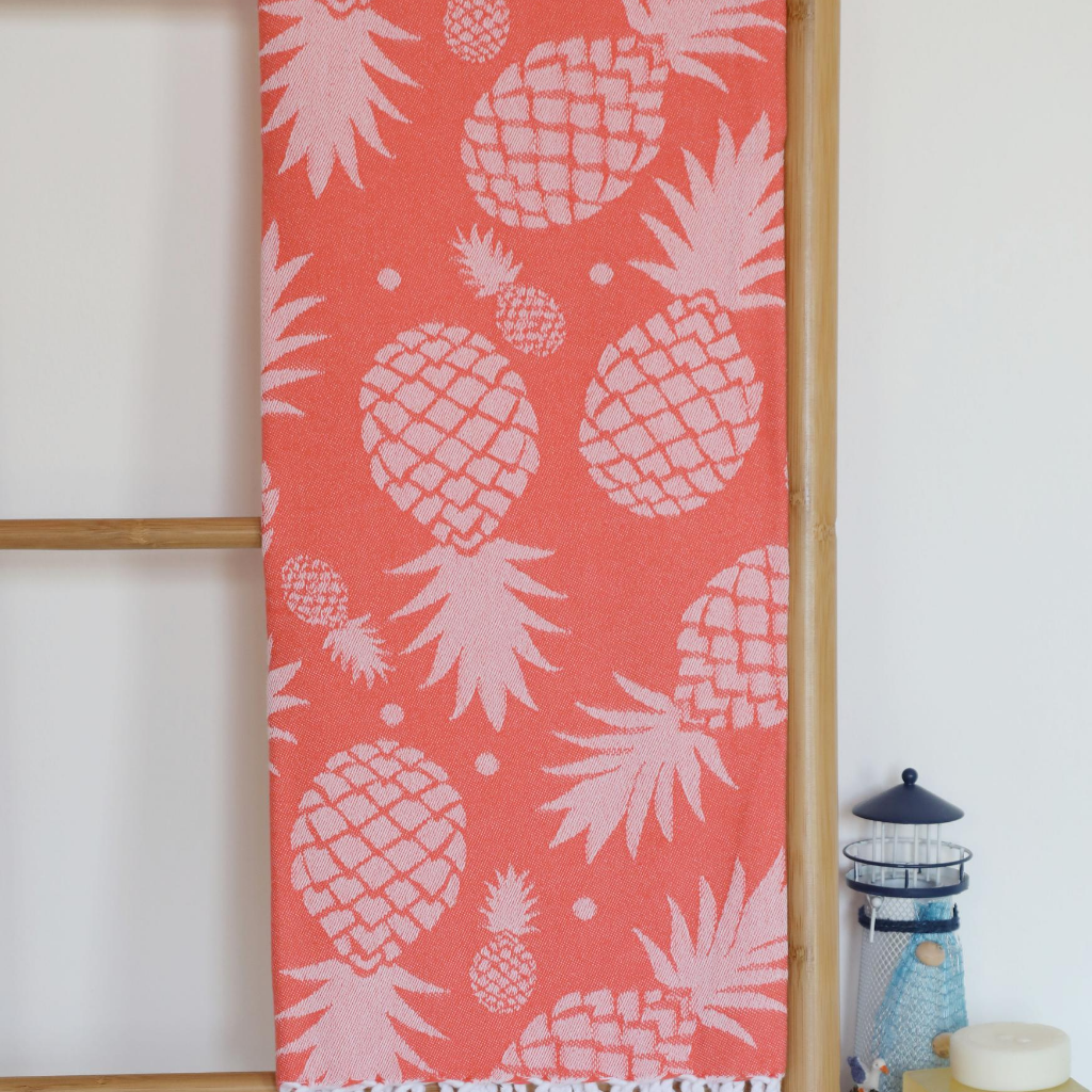 Pineapple Turkish towel in coral color with pineapple designs
