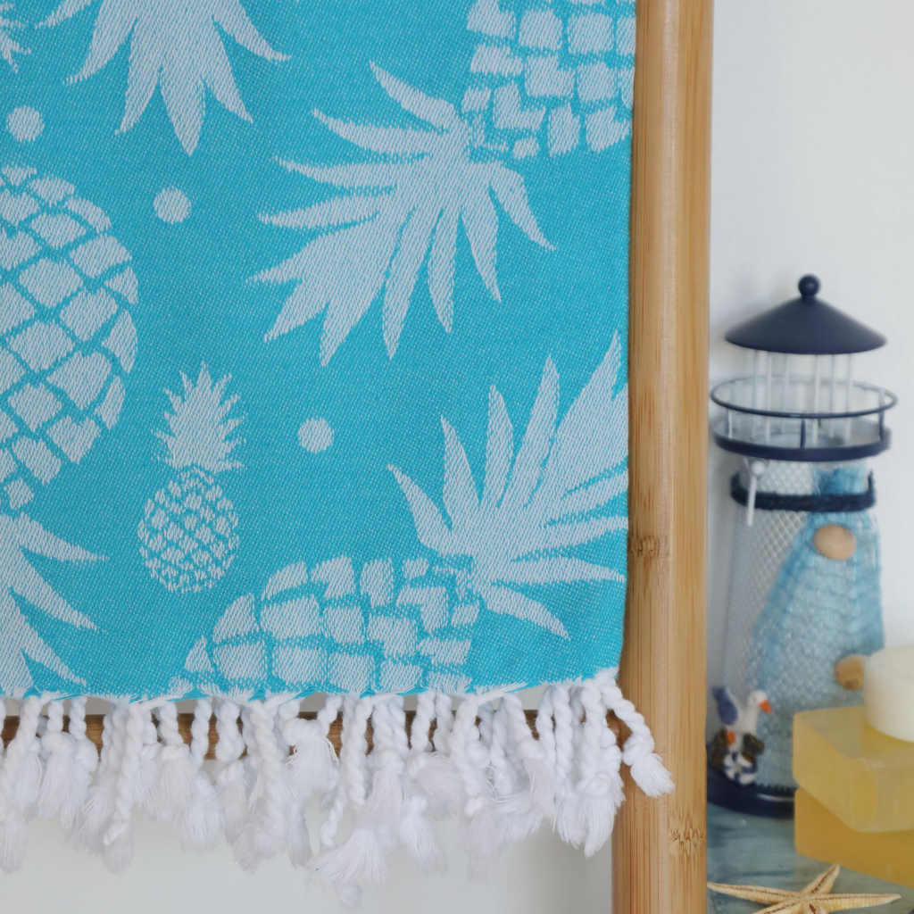 Blue, pineapple Turkish peshtemal towel has tassels